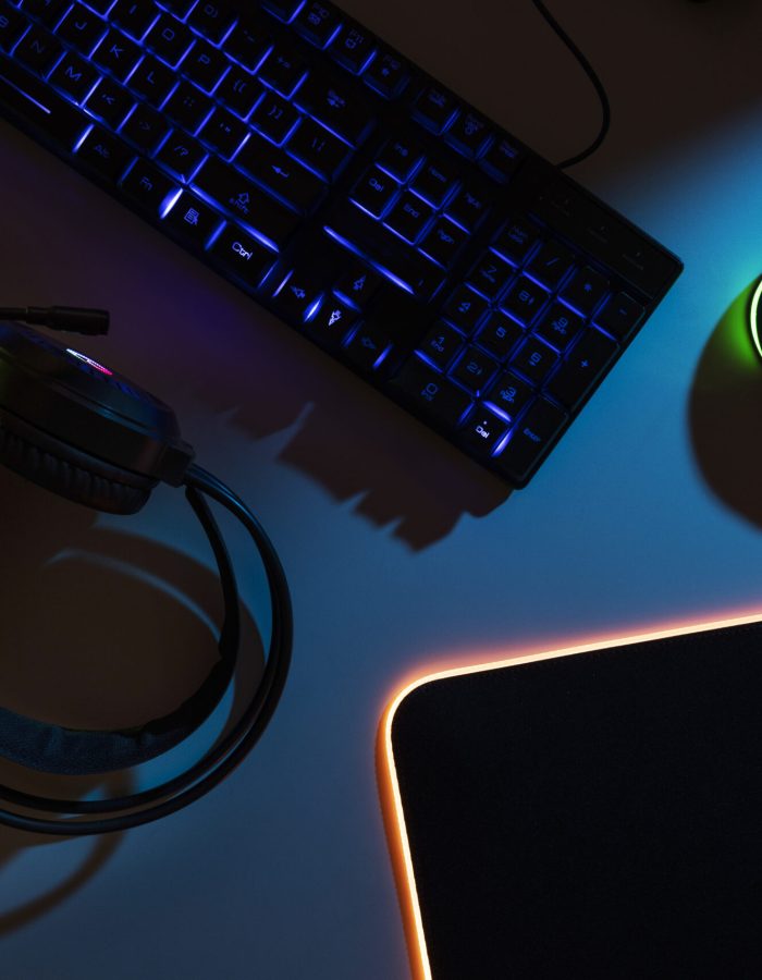 view-neon-illuminated-gaming-desk-setup-with-keyboard (1)